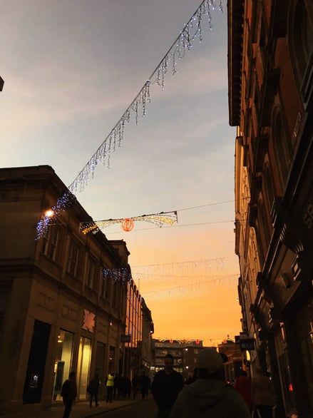 City centre street at sunset with festive lights