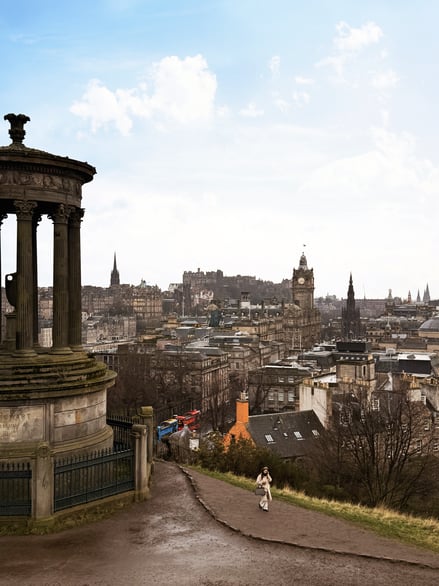 View from Calton Hill overlooking Edinburgh skyline with historic buildings