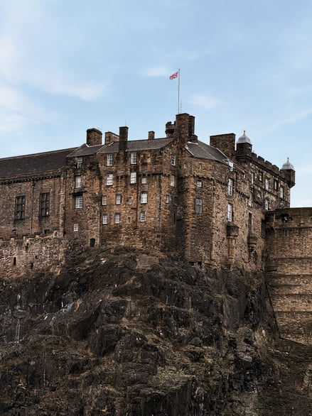 Colourful shopfronts along Victoria Street in Edinburgh Old Town