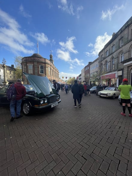 An image of an old car show in Newcastle town.