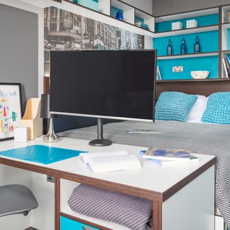 Bedroom with large flat screen TV