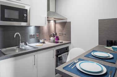 Kitchen area with breakfast bar