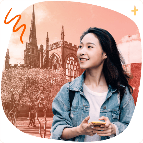 Student with phone in front of Coventry landmarks