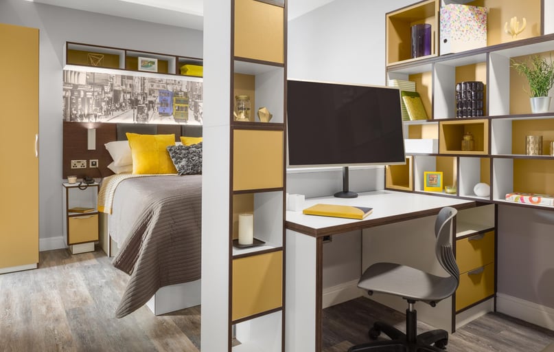 Bedroom with large flat screen TV