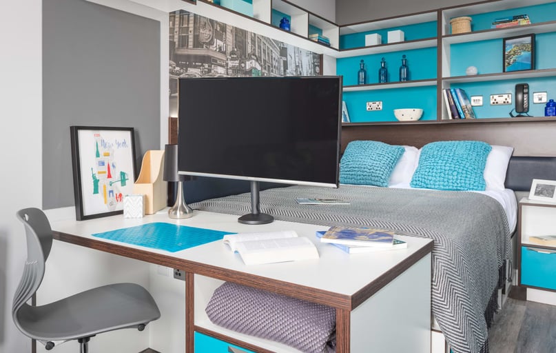 Bedroom with large flat screen TV